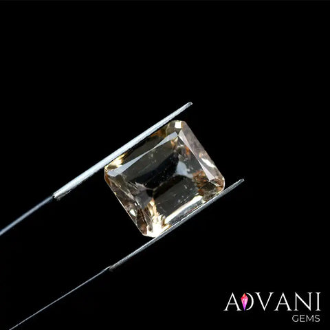 Exquisite 12.65ct Emerald Cut Yellowish-Orange Topaz from Pakistan