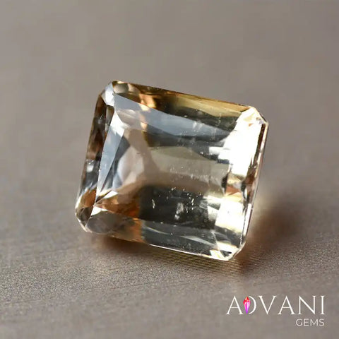 Exquisite 12.65ct Emerald Cut Yellowish-Orange Topaz from Pakistan